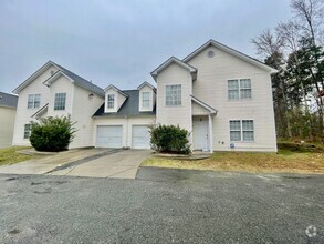 Building Photo - Must see 4 bedroom 2.5 bath townhouse with...