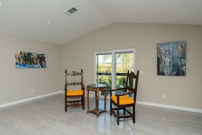 Building Photo - 6088 De La Rosa Ln