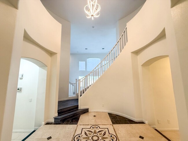 Building Photo - SPACIOUS HOME IN GATED COMMUNITY WITH POOL, RV PARKING & 4-CAR GARAGE!