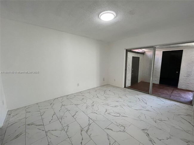 Building Photo - 6520 NW 98th Terrace