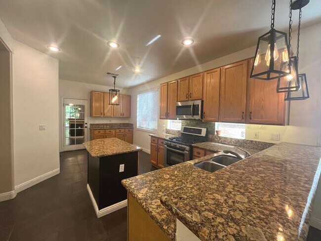 Building Photo - Discover this Gem w/sparkling pool & spa!