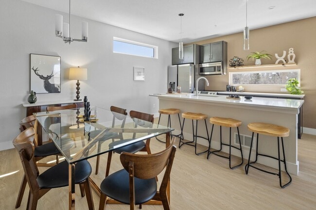 Building Photo - MOVE IN INCENTIVES!!  Bright & Spacious End-Unit Townhome with Garage, private yard area, and Pet...