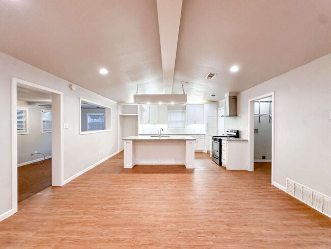 Building Photo - Spacious Living & Modern Upgrades
