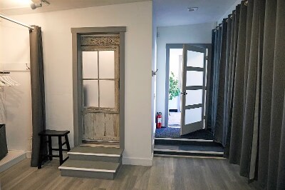 Steps lead to separate bedroom with sliding "barn" door for privacy. - 9 May St