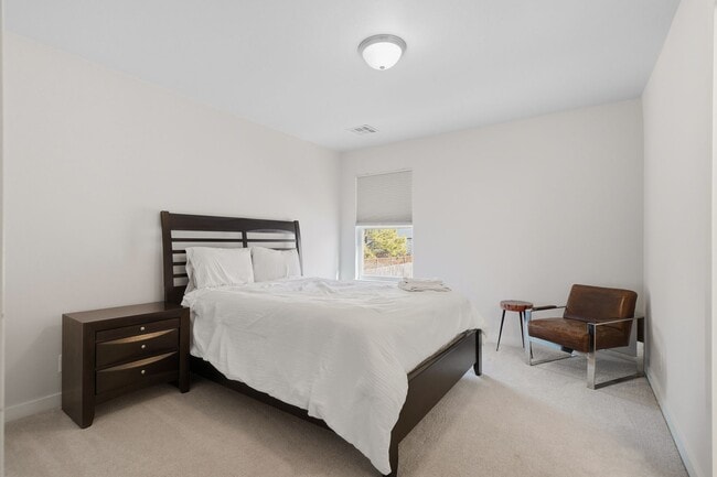 Building Photo - Stunner! This beautiful home features a spacious open floor plan with primary suite and private o...