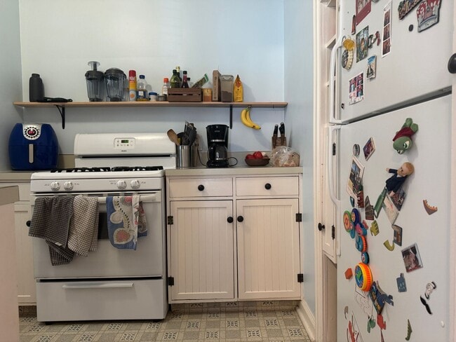 Building Photo - Charming Brick Ranch with Finished Basement & Fenced Yard