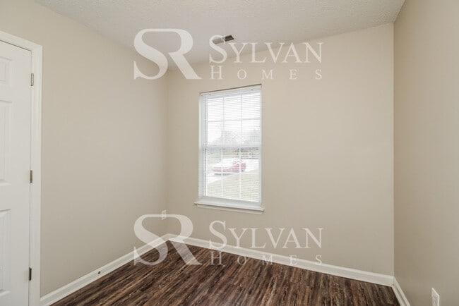 Building Photo - Lease today! No extra charge for contentme...