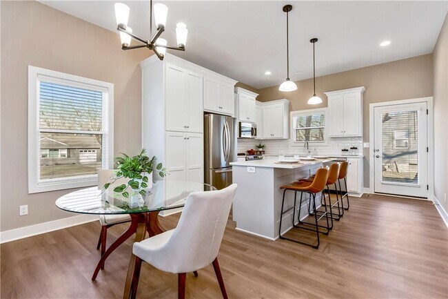 Kitchen and seating area - 11030 W 55th Ter