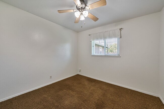 Building Photo - 3BR + Office Home in Excellent Condition with Storage Sheds and Garage Workspace!