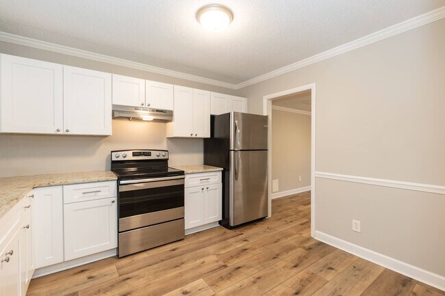 Building Photo - Fully Renovated 2BR Townhome-Style Condo – Available Now!