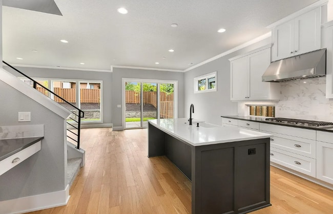 Building Photo - Stunning Bethany Farmhouse with Chef’s Kitchen, Media Room, Main-Level Suite & Luxury Designer Fi...