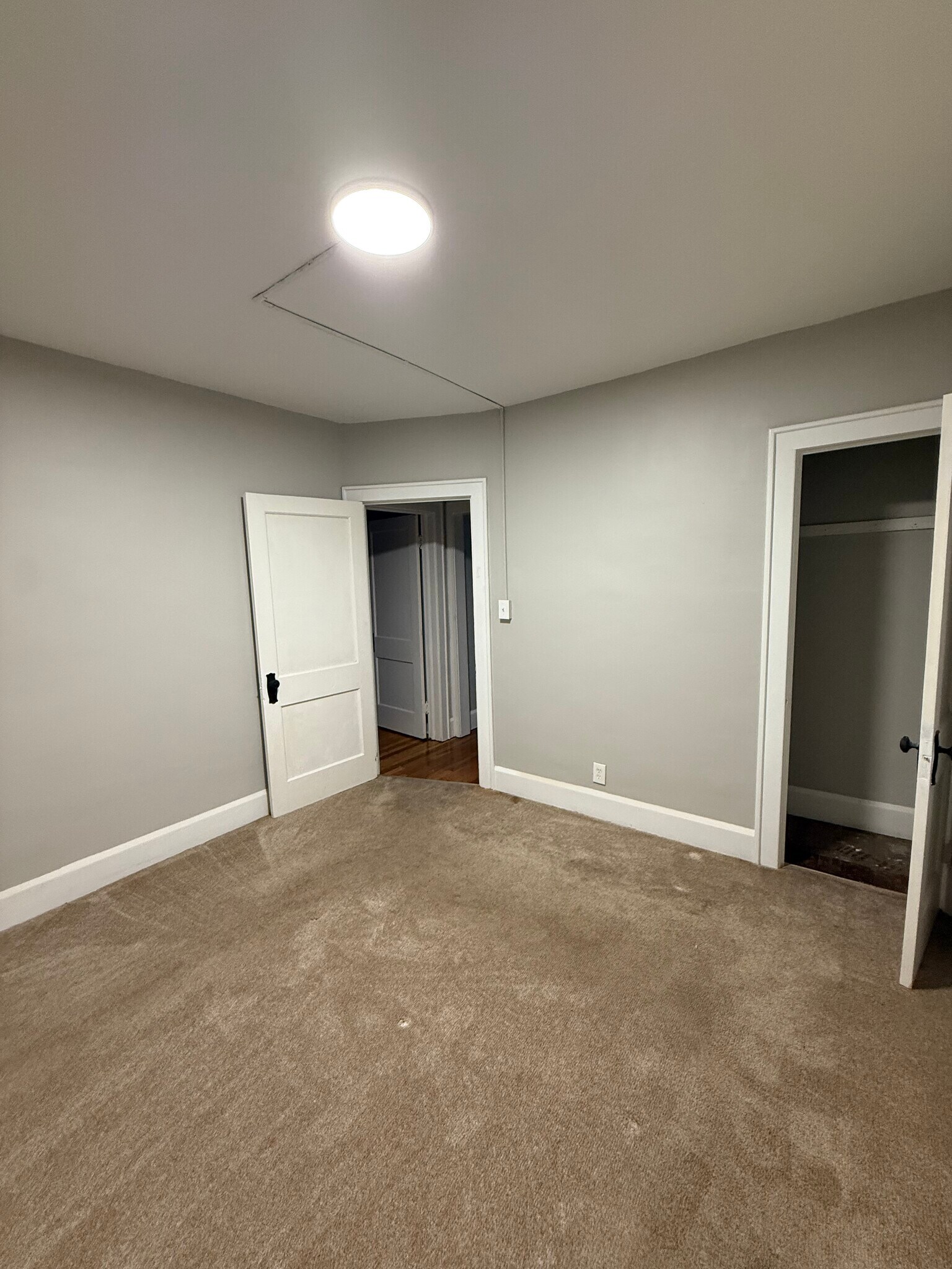 1st room with carpery and closet - 3616 E 106th St