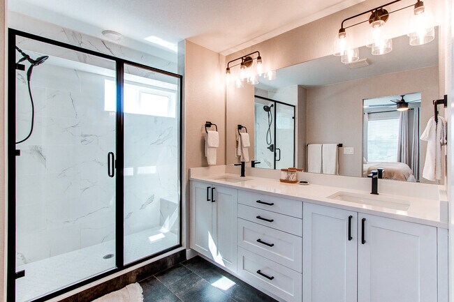 Master bathroom with dual vanity - 8500 W 62nd Ave