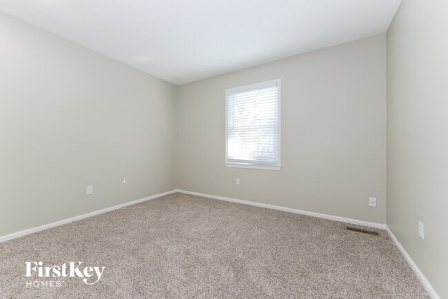 Building Photo - 1613 E Frontier Ln