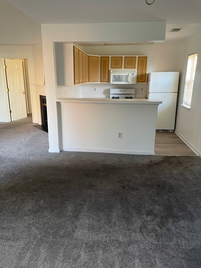 Kitchen with island - 9101 Gracious End Ct