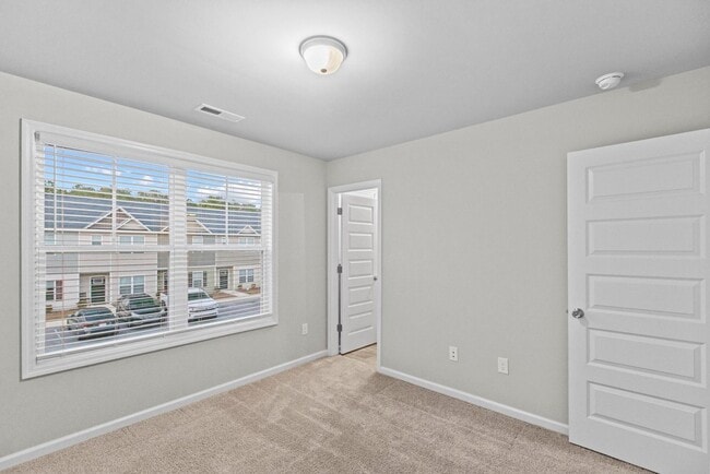 Building Photo - 50% off the first months rent if a lease is signed by 1/15