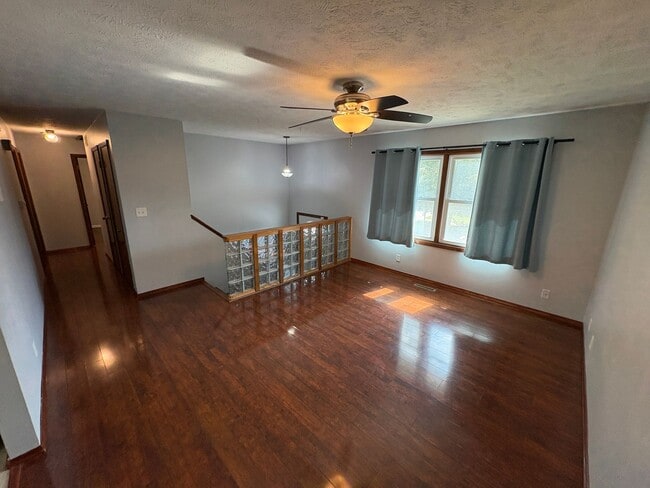 Building Photo - Spacious Single-Family Home with Fenced Backyard & Attached Garage