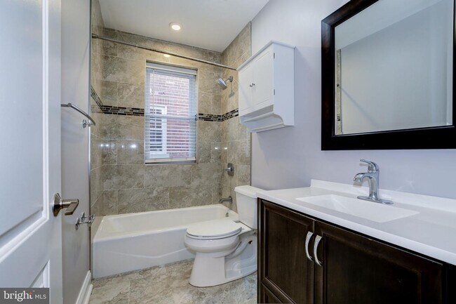 Building Photo - 4209 JENIFER St NW
