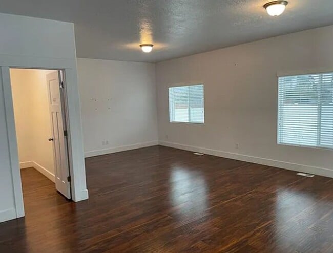 Building Photo - Spacious 4-Bedroom Home with Finished Basement in Taylorsville