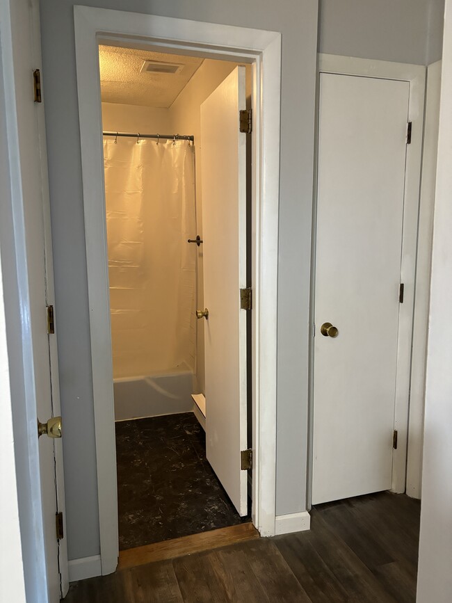 Bathroom entrance and two closets - 5 Turnpike Rd