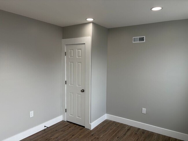 Building Photo - Newly Renovated 2- Story Townhome with Front Porch and Back Yard