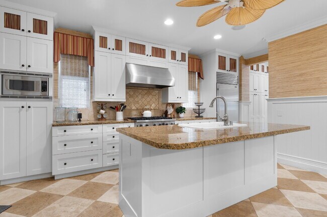 Building Photo - "Coastal Tommy Bahama at 208 East Balboa: Fully Furnished 3-Bed Sanctuary with Rooftop Deck