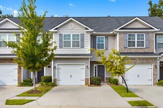 Building Photo - 3 bedrooms, 2.5 bathrooms townhome in the ...