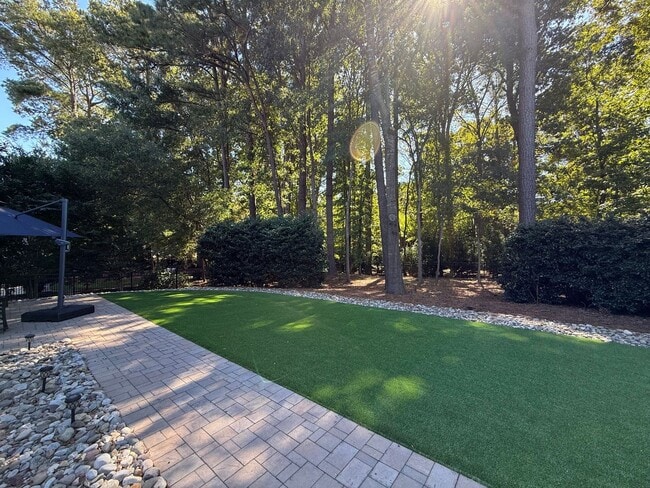 Building Photo - Luxurious 4BD, 3.5BA North Raleigh Home wi...
