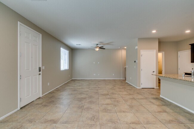 Building Photo - Spacious Townhouse with Loft & Rare 3-Car Garage!