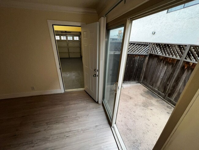 Building Photo - Upgraded Condo with 1 Attached Garage & Private yard.  Gated Complex.