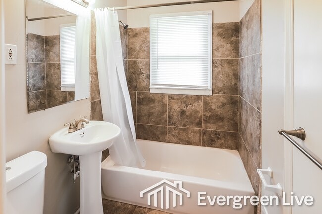 Building Photo - 9512 Bennington Ave