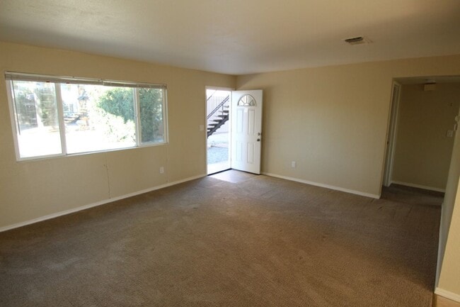 Building Photo - Beautifully Renovated 2 Bedroom 1-Bath Apartment – Private Patio • Downstairs Unit • Prime Location