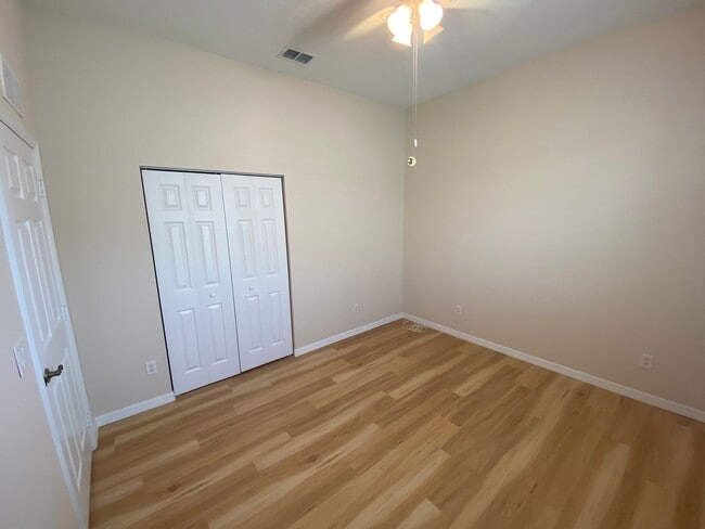 Building Photo - ANNUAL Lease – Unfurnished – Golf Course Lot - Designer Home in the highly sought-after gated com...