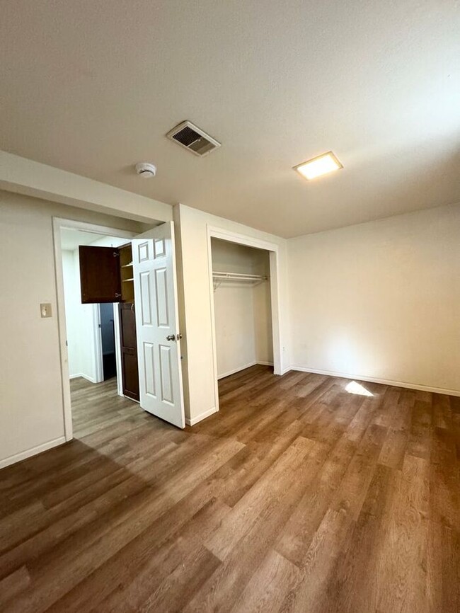 Building Photo - First Month Free - Spacious 4 bedroom 2 ba...