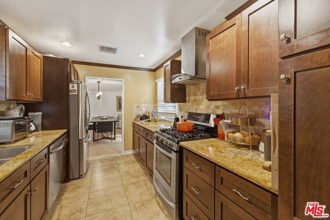 Building Photo - 5208 Woodman Ave