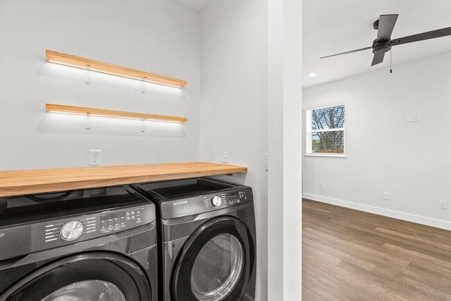 Building Photo - Brand new 2 bed/2 bath, central a/c, dishwasher, washer & dryer, deck & patio! March rent free!