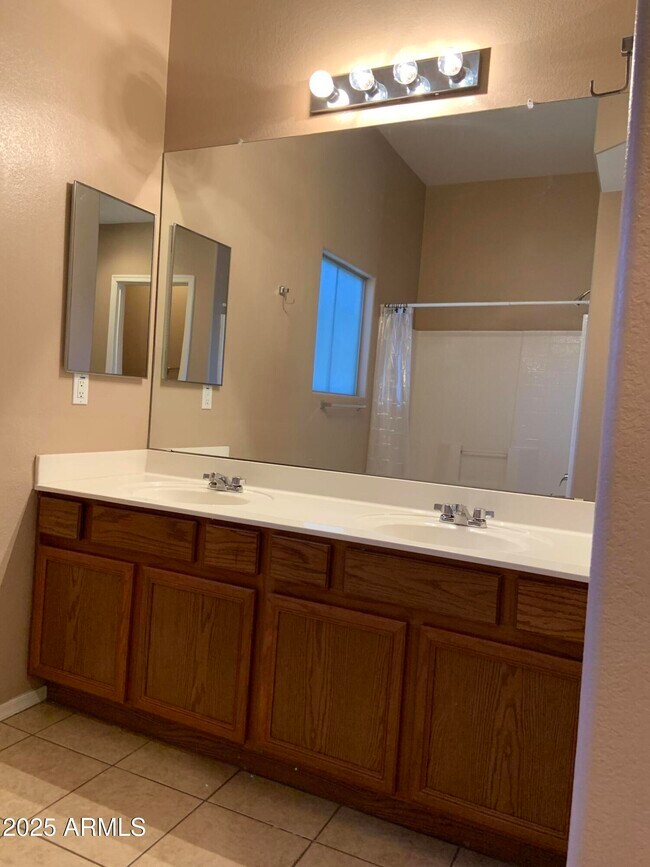 Building Photo - 7977 W Carolina Dr