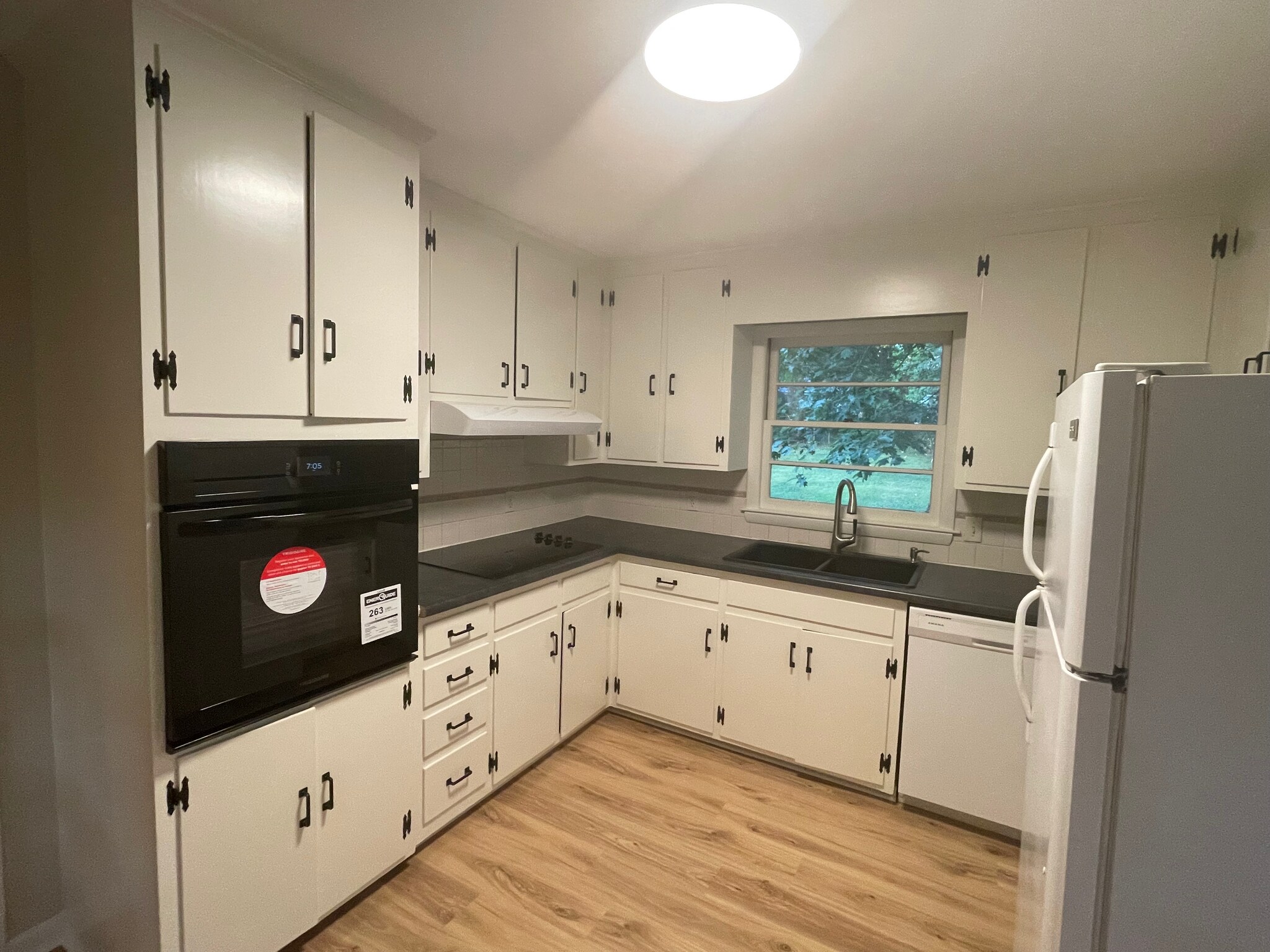 Updated kitchen with new counter, sink, oven and cooktop. - 2112 Kilburn Rd