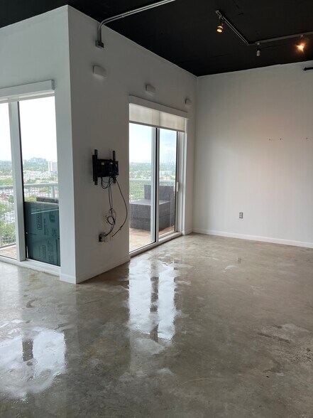 LIVING ROOM AREA & BALCONY - 10 South River Drive