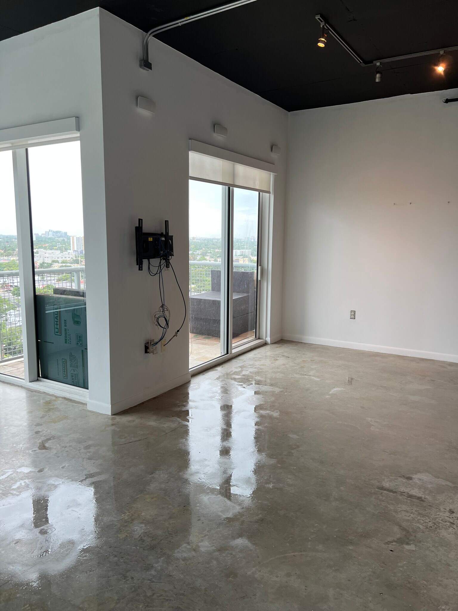 LIVING ROOM AREA & BALCONY - 10 South River Drive