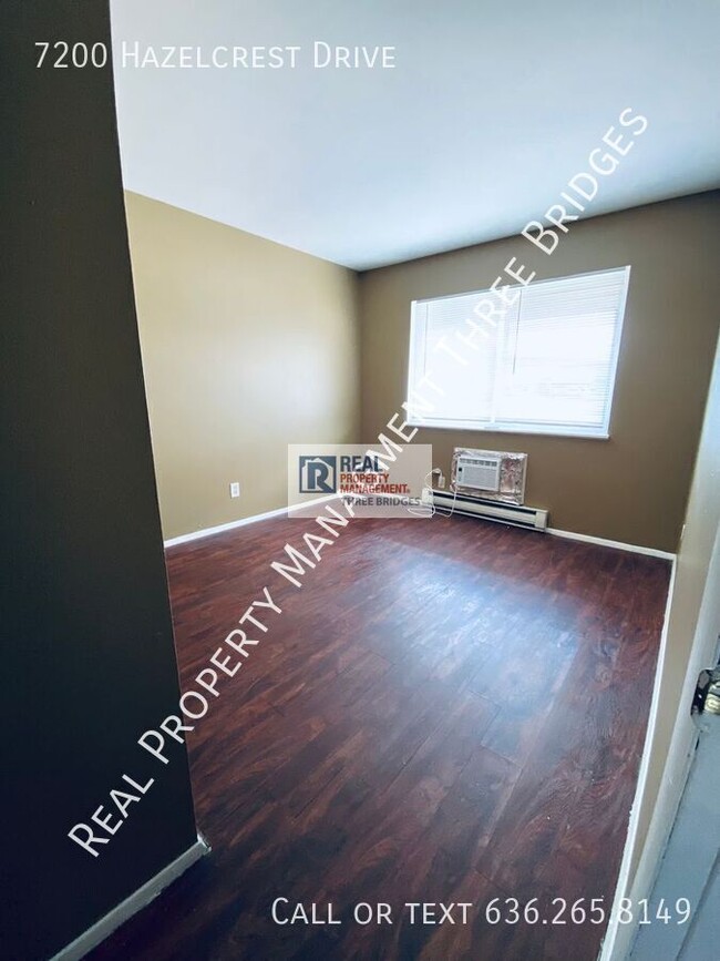Building Photo - 7200 Hazelcrest Dr