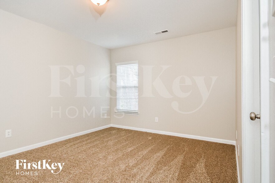 Building Photo - 6465 Flintlock Ct