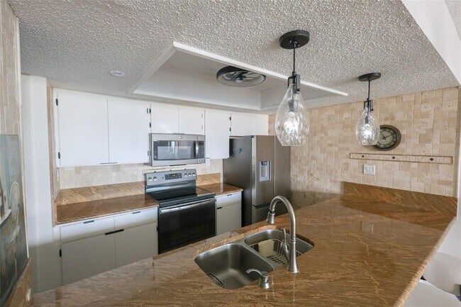 Building Photo - 440 S Gulfview Blvd