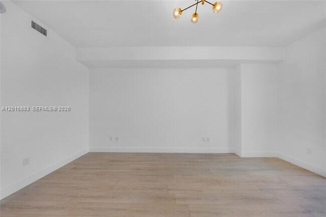 Building Photo - 7901 Hispanola Ave
