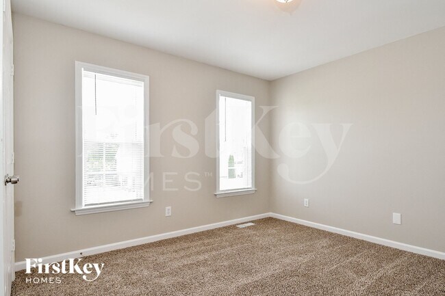 Building Photo - 6033 Old Plank Rd