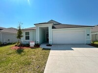 Building Photo - PREMIUM FINISHES AND POND VIEW!!  A PREMIU...