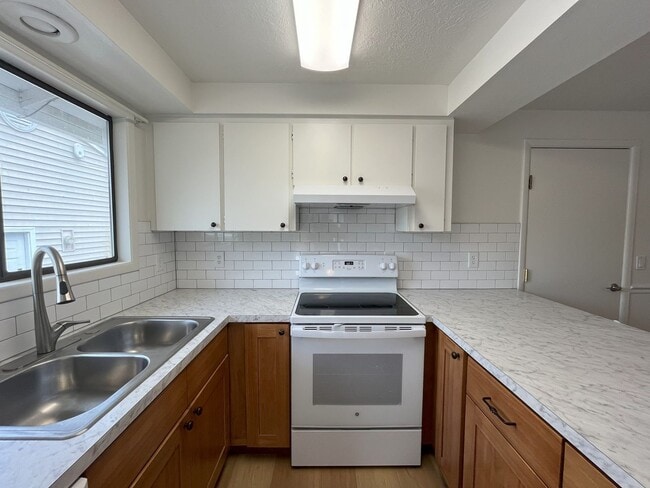 Building Photo - Full of Light—Your Next Home Awaits!