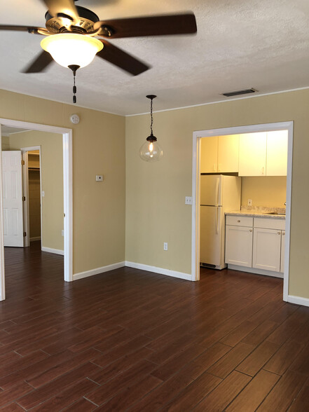 Living room - facing kitchen and bedroom to the left - 2241 W Pensacola St