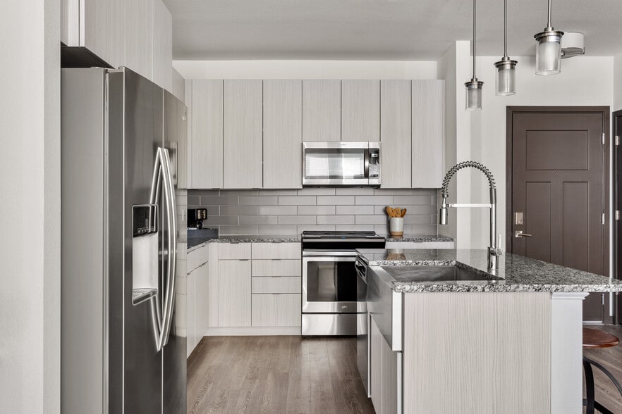 Create meals and memories in your modern kitchen. - Covell on the Promenade
