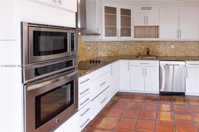 Building Photo - 6423 Collins Ave